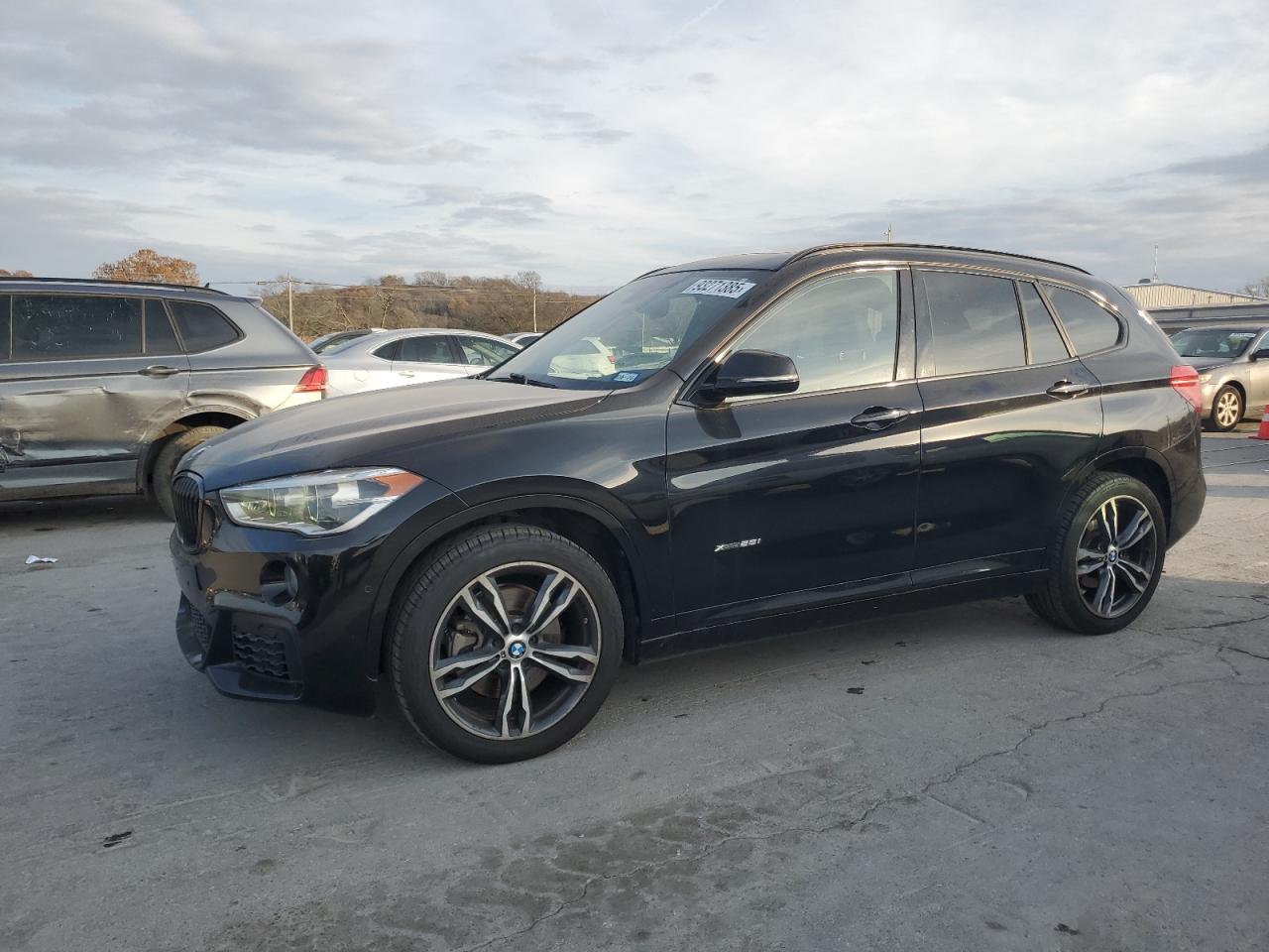 2017 BMW X1 VIN WBXHT3C31H5F72345 photo 1