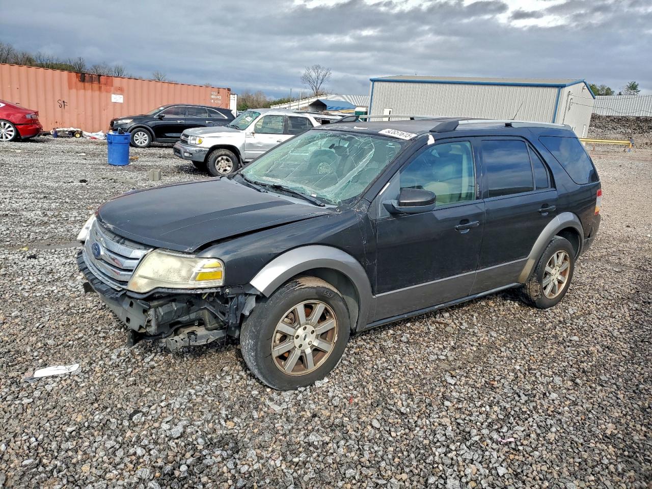 2009 Ford Taurus VIN 1FMDK02W29GA03382 photo 1