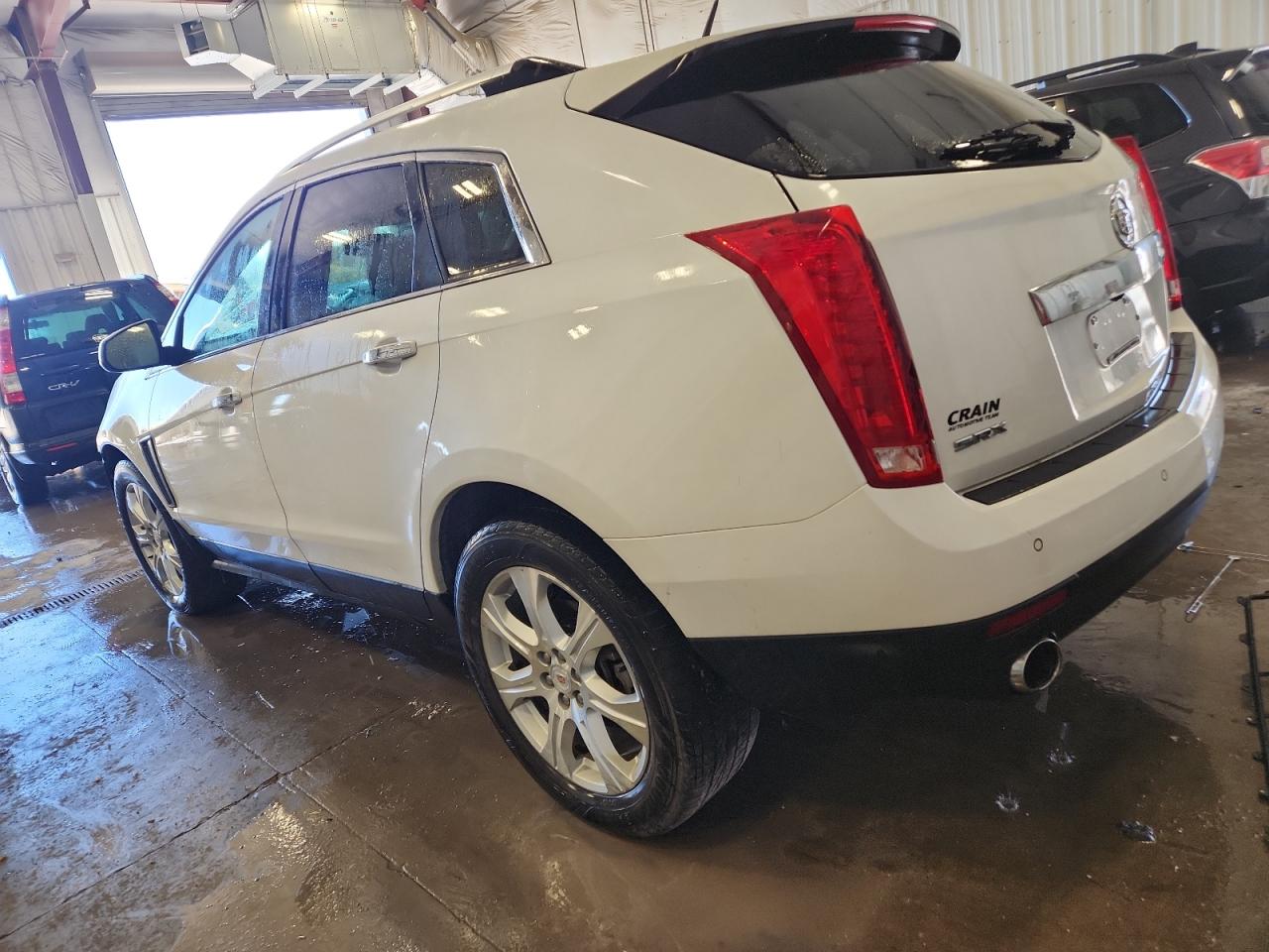 2013 Cadillac Srx VIN 3GYFNDE38DS654095 photo 2