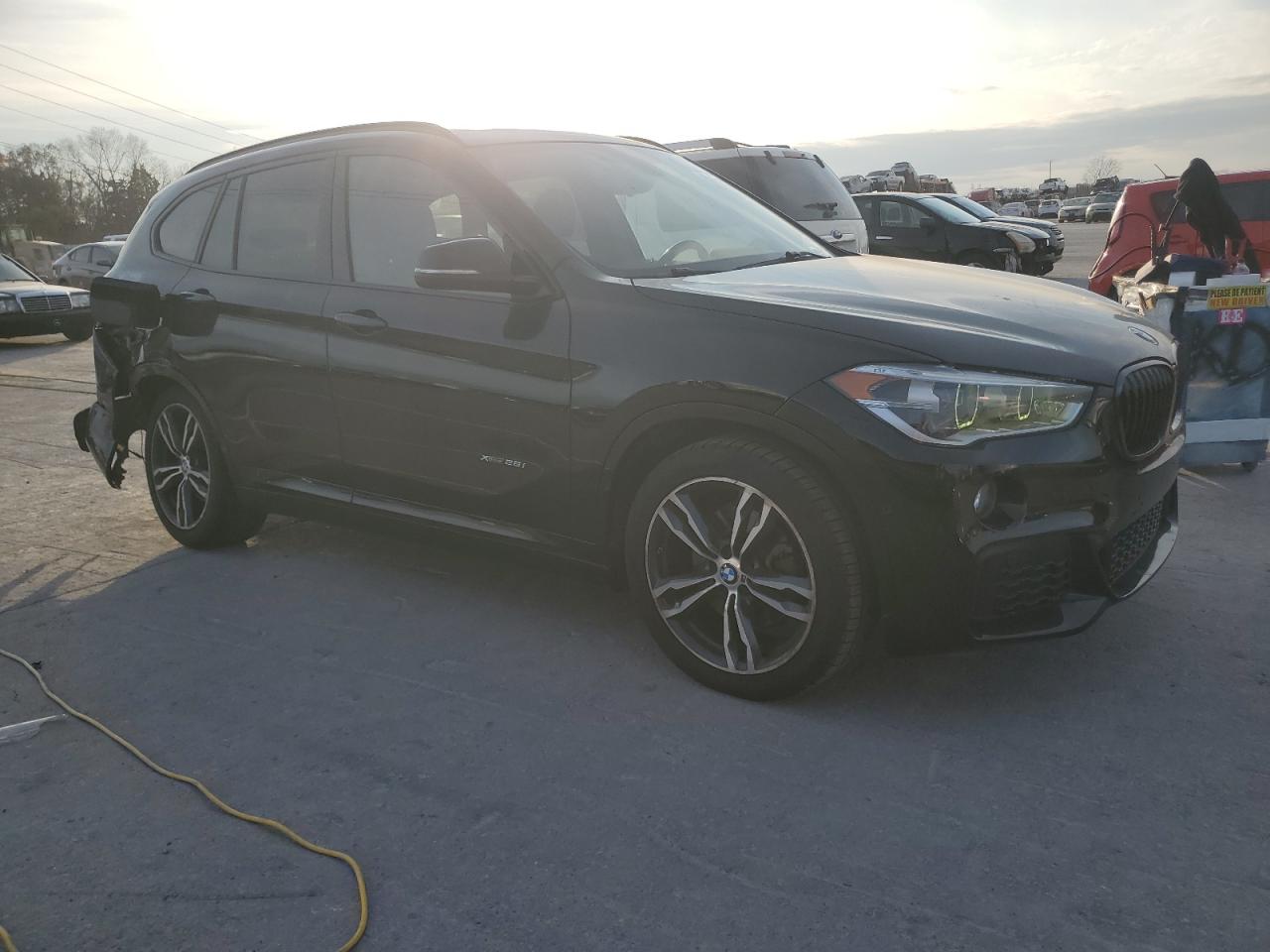 2017 BMW X1 VIN WBXHT3C31H5F72345 photo 4