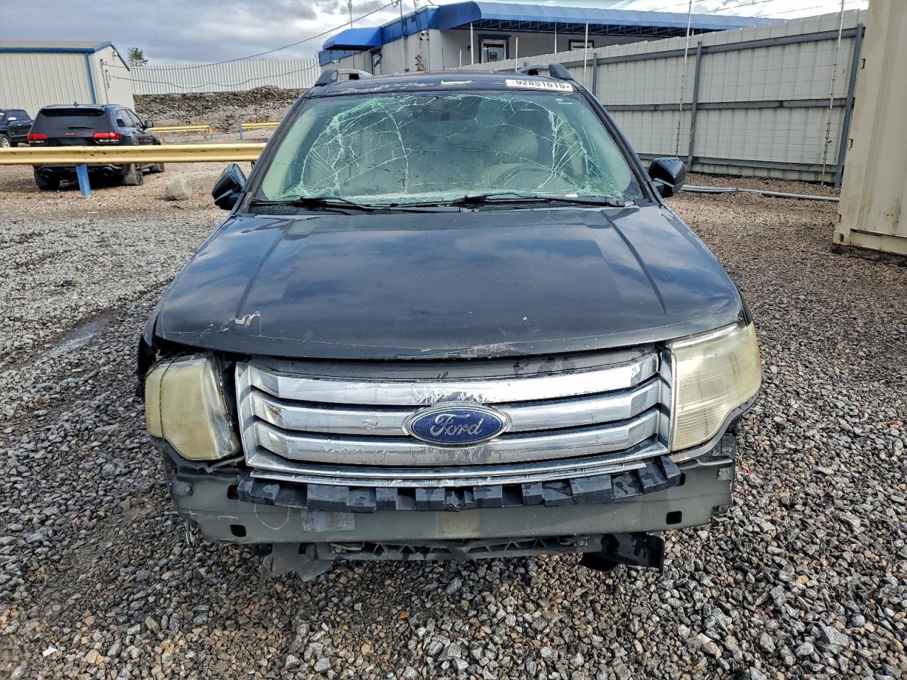2009 Ford Taurus VIN 1FMDK02W29GA03382 photo 5