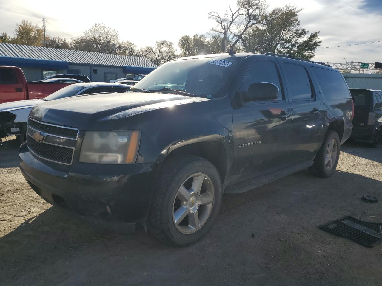 2010 Chevrolet Suburban VIN 1GNUKJE32AR172023 photo 1