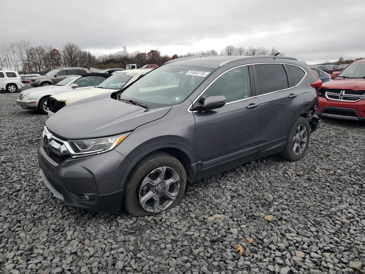 2019 Honda Crv VIN 2HKRW2H86KH674770 photo 1