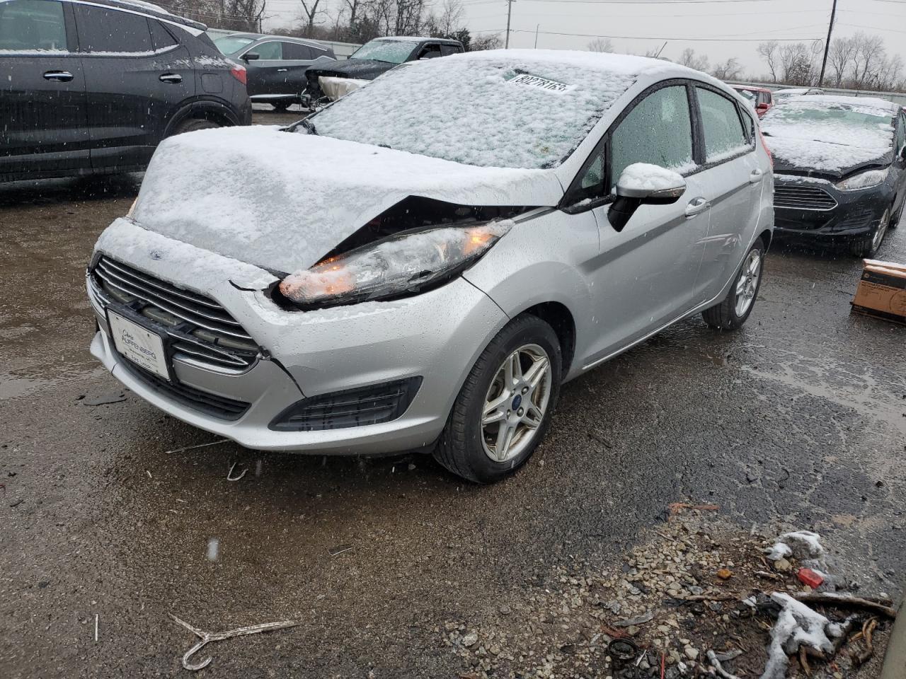 2019 Ford Fiesta VIN 3FADP4EJ7KM116887 photo 1
