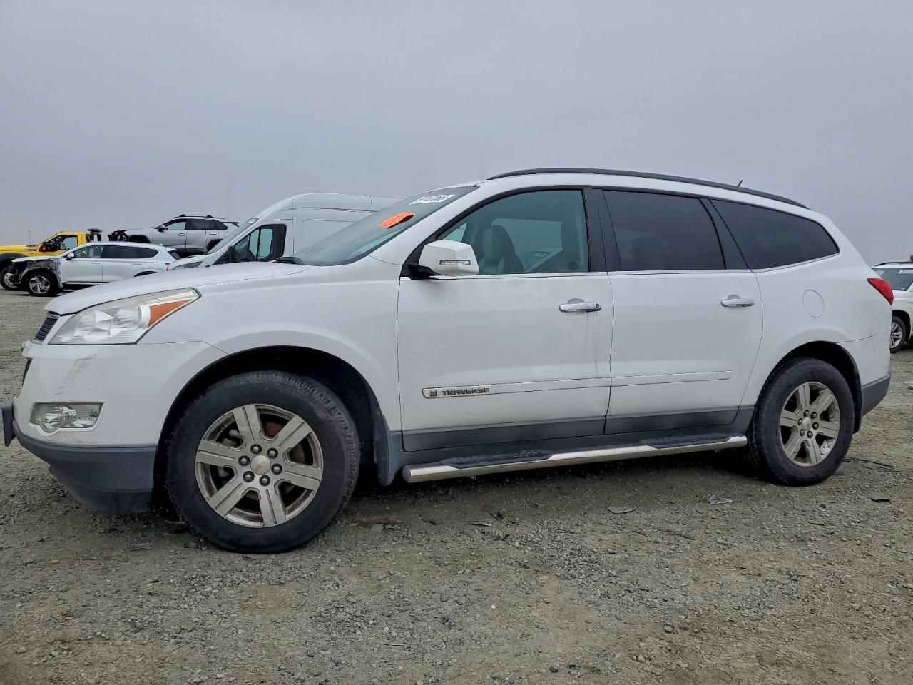 2009 Chevrolet Traverse VIN 1GNEV23D59S174138 photo 1
