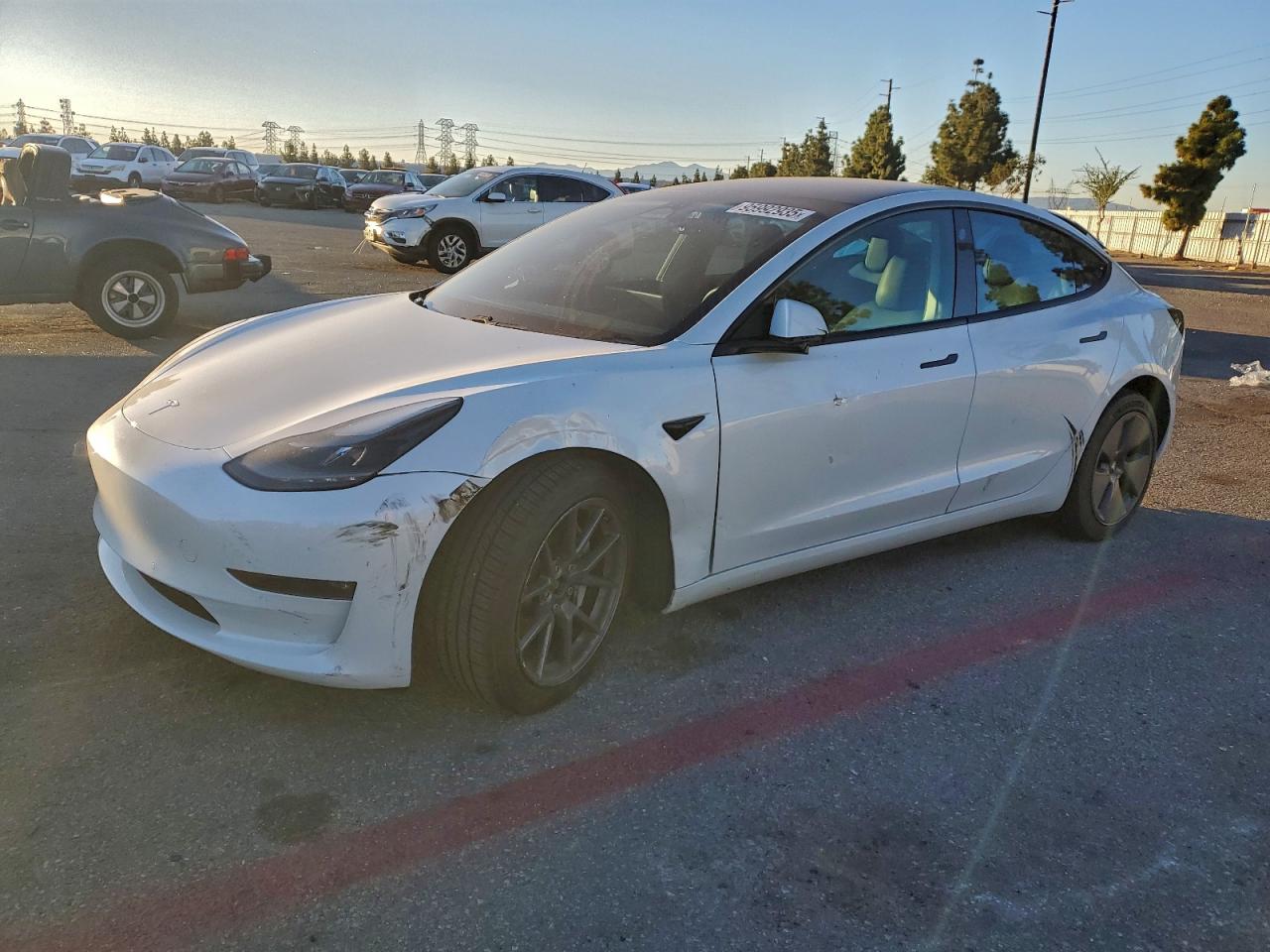 2021 Tesla Model 3 VIN 5YJ3E1EB3MF070582 photo 1