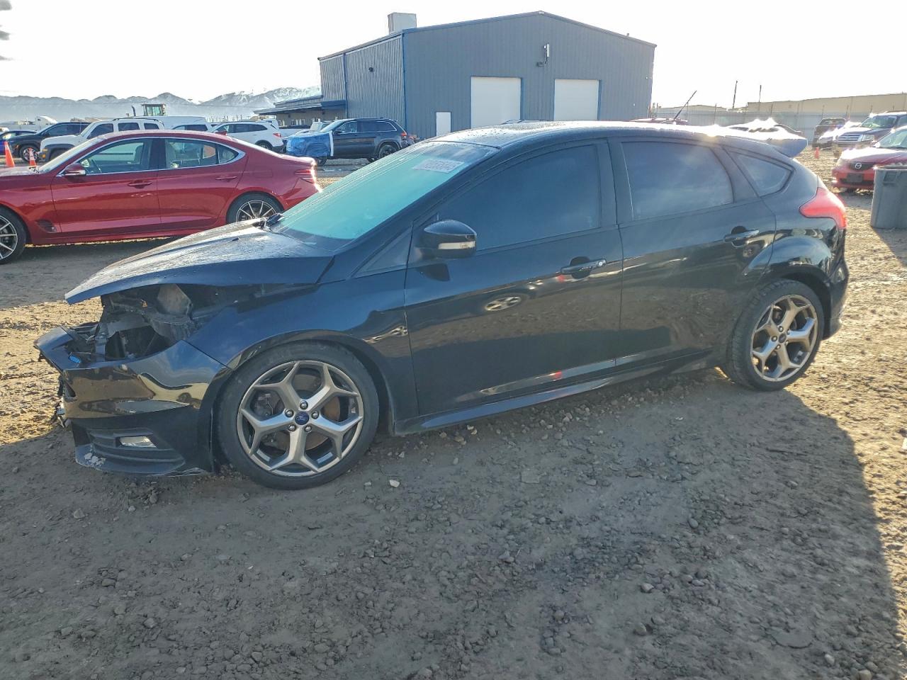 2016 Ford Focus VIN 1FADP3L90GL337212 photo 1